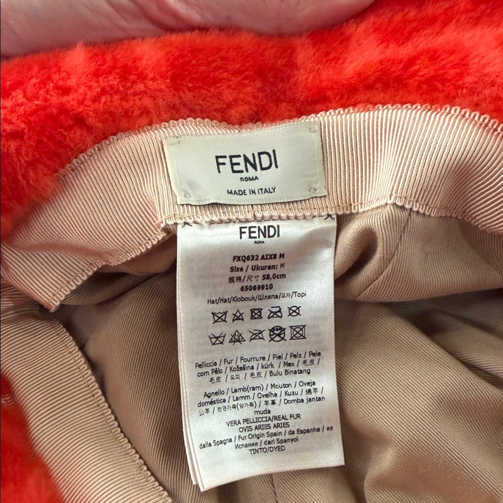 Fendi shearling bucket hat with a Zucca monogram pattern.Orange/Red Fuzzy - Picture 8 of 9